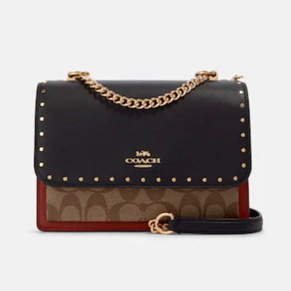 KLARE CROSSBODY IN SIGNATURE CANVAS WITH RED RIVETS BAG. - Picture 1 of 1